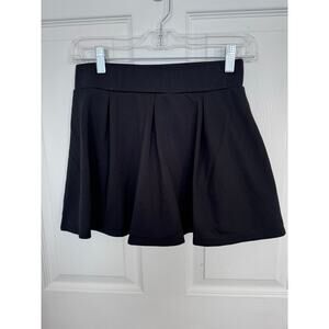Women’s skirt size medium Peperco Black pleated skirt with attached shorts